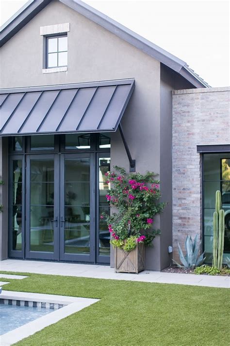 stucco house with metal roof|exterior stucco wall.